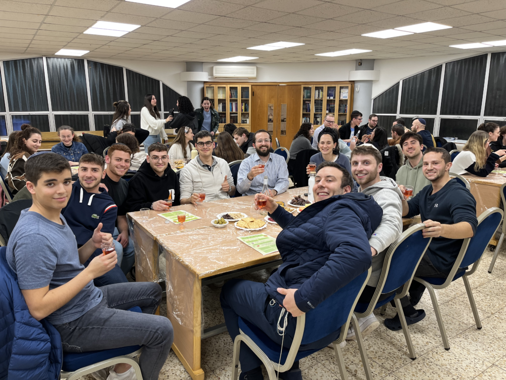 A group of guys from JLIC in Herzliya celebrating Tu B'shvat together with a seder