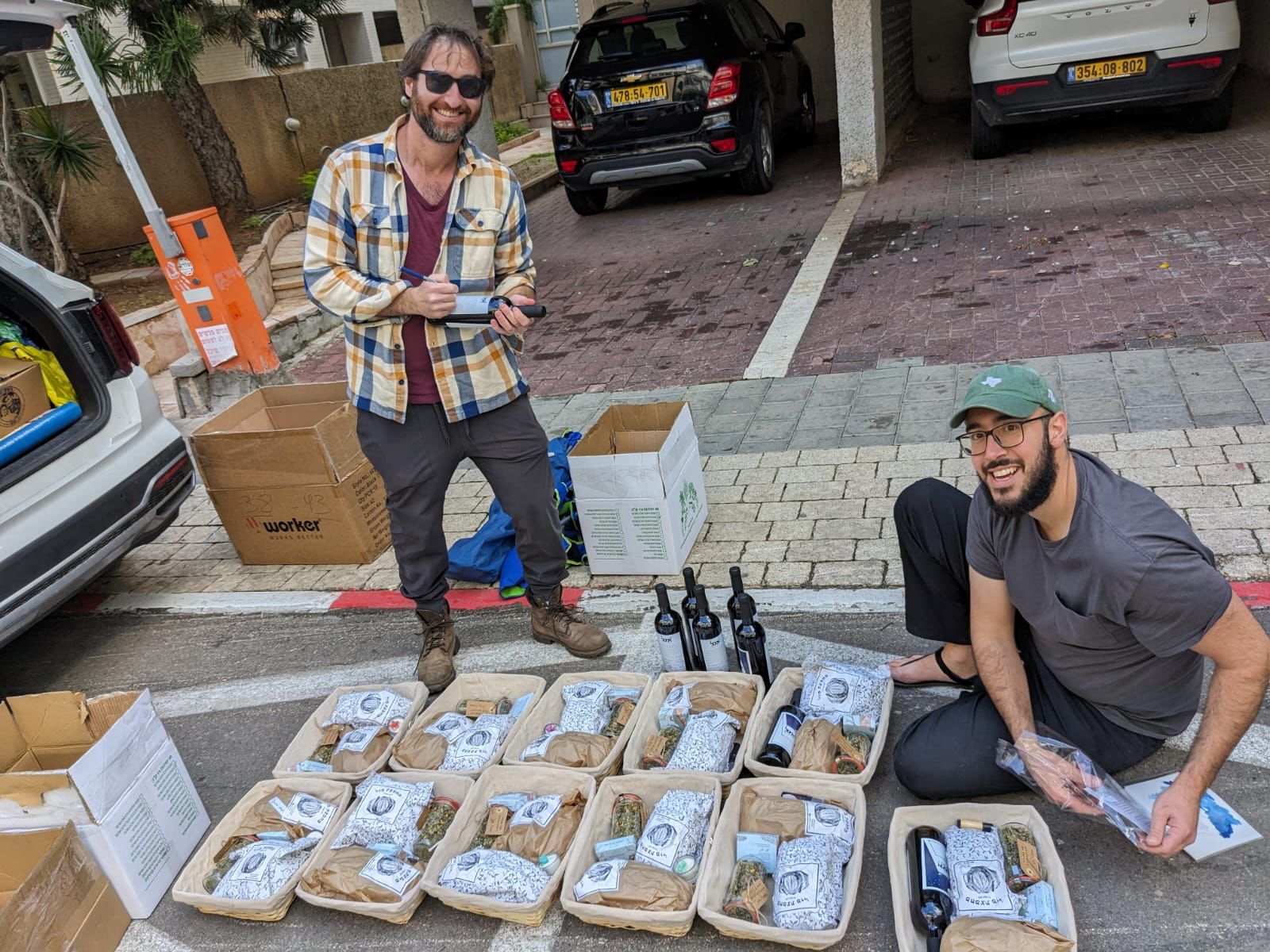 Aryeh, the owner of a boutique winery, and Yonatan from Sourdough Mazal creating packages for Military families while Connecting Small Businesses.