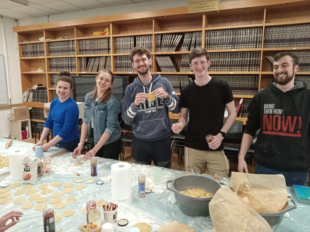 Students from the JLIC Technion Community baking hamentashen 