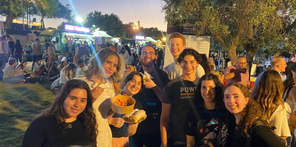 Students from the JLIC Summer program at Harova having fun at the Jerusalem food festival.