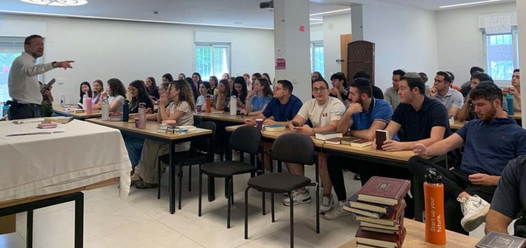 Students at JLIC Summer Program @ TVA listen to a speaker as part of their weekly activities.