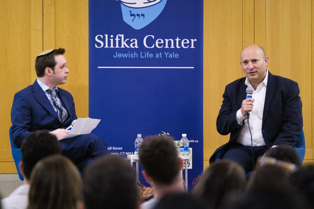 JLIC Director Rabbi Alex Ozar interviewed former Israeli PM Naftali Bennett at a Yale JLIC event about Israel's future.