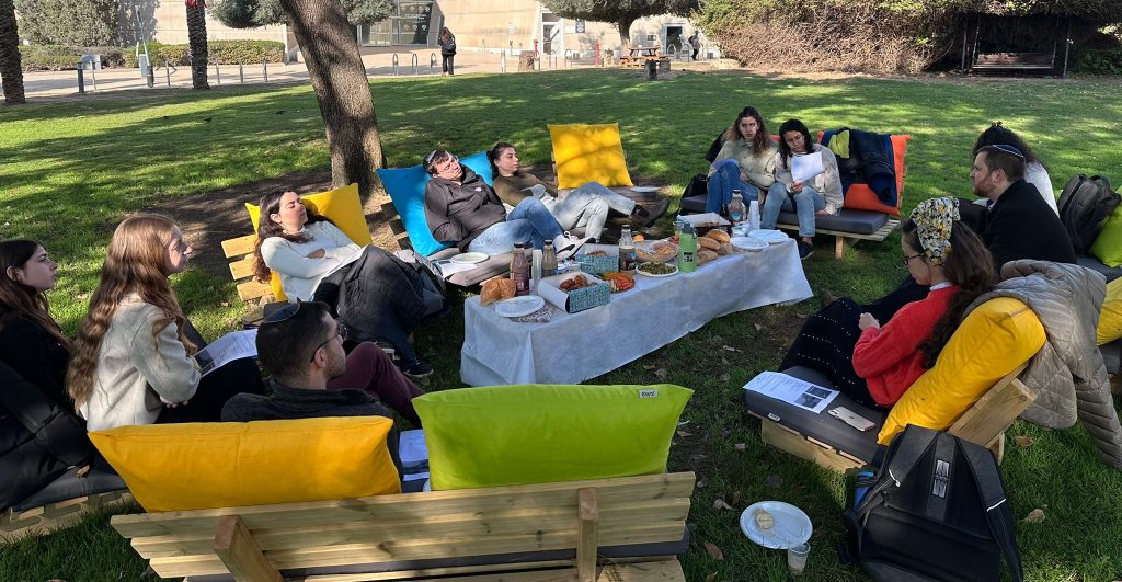 Ben Gurion University students gathered for a picnic breakfast under the desert sky to celebrate Tu B'Shvat.