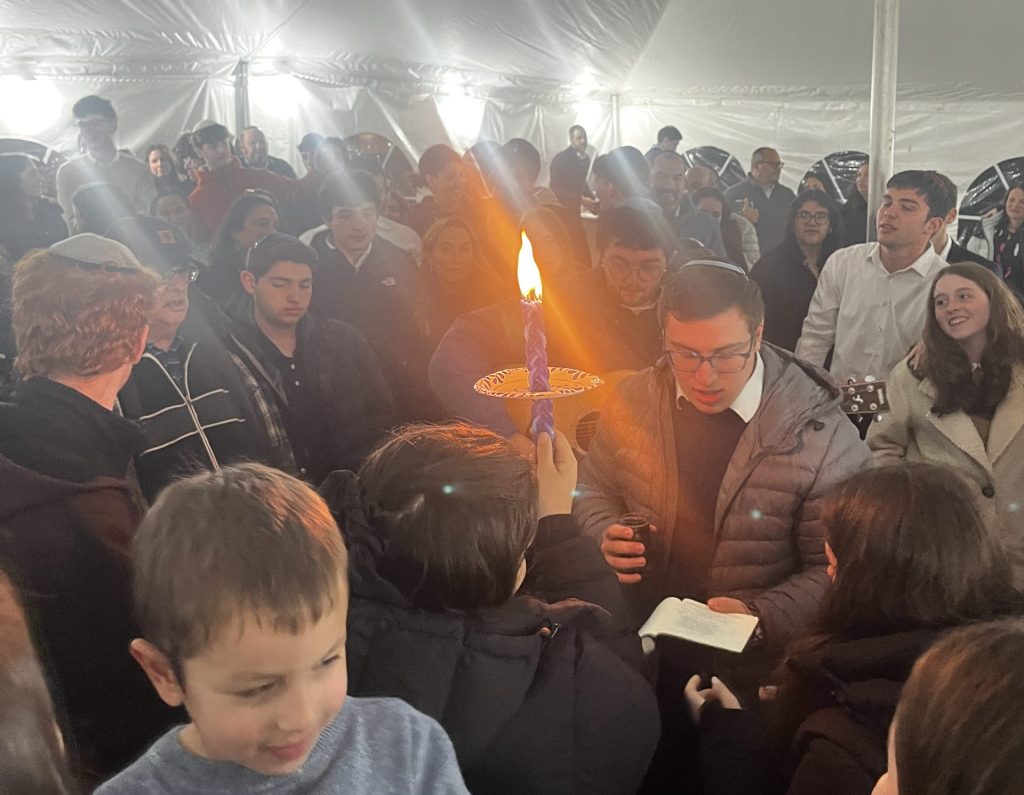 Families gathered in the JLIC Binghamton tent for a musical Havdallah.