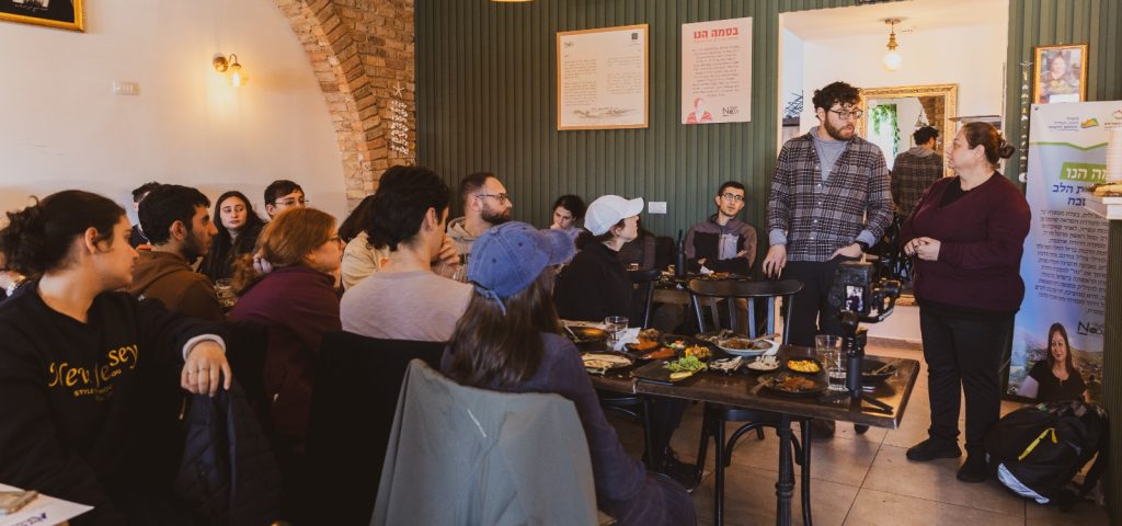 The JLIC group gathered for lunch at Noor, the only kosher druz restaurant owned by Basma Hino 