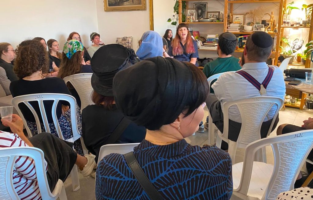 JLIC Community Members listen to the presentations at the mental health awareness event