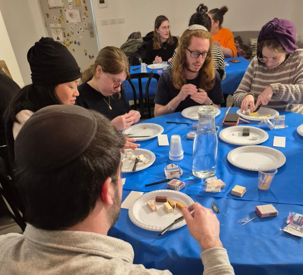 JLIC community members participating in the clay workshop